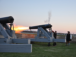 Members of the Fairhaven Village Militia fire off cannon #3 at Fort Phoenix on Saturday, 5/23/15, at dusk. The Militia has several events during the year when they fire off the five 24-pound Seacoast Defense cannons. Neighb News file photo by Beth David.