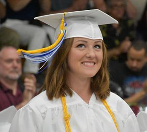 Elizabeth Cadieux stands up to be recognized for choosing to join the military after graduation. Photos by Beth David.